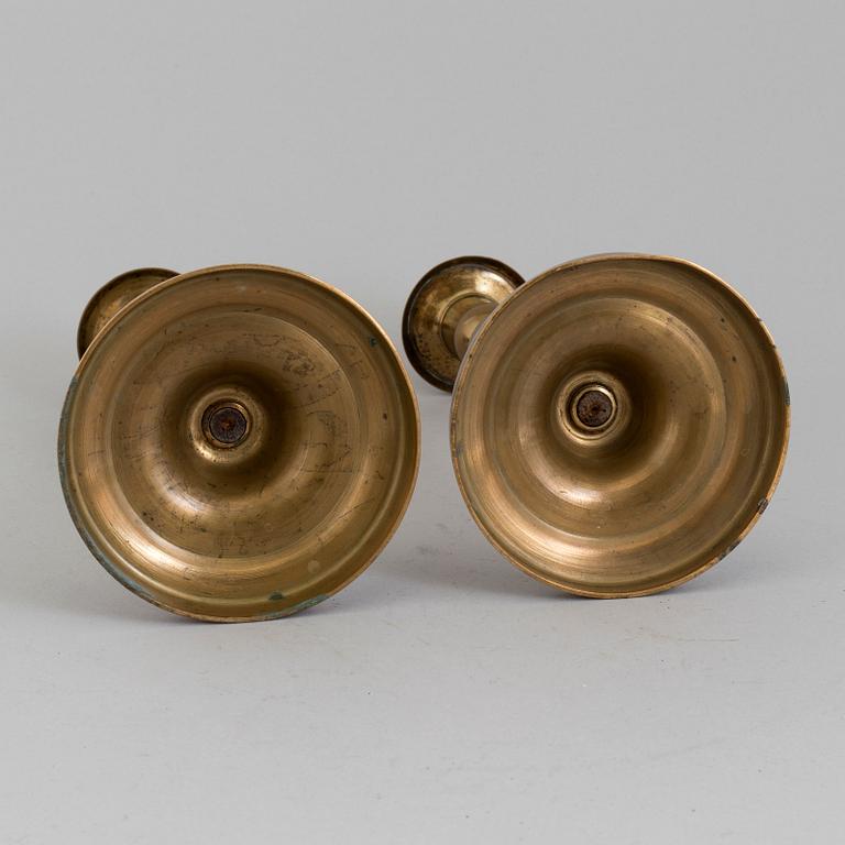 A PAIR OF BRONZE CANDLESSTICKS, 19th century.