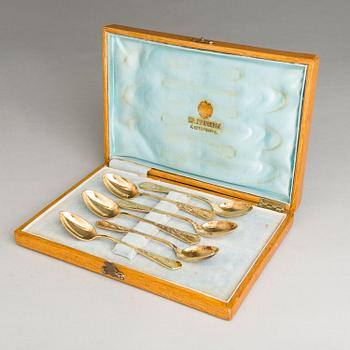 Six gilt silver coffee spoons, mark of Grachev Brothers, Saint Petersburg, Russian import mark, early 1900s. In box.