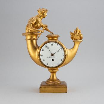 A 19th century Empire mantle clock.