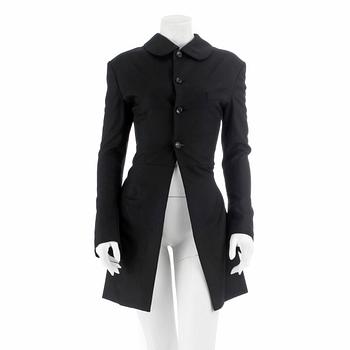 509. COMME DES GARÇONS, a black wool and lycra ladies suits jacket. Size m.