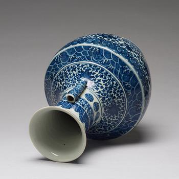 A blue and white vase, late Qing dynasty with Qianlong mark.