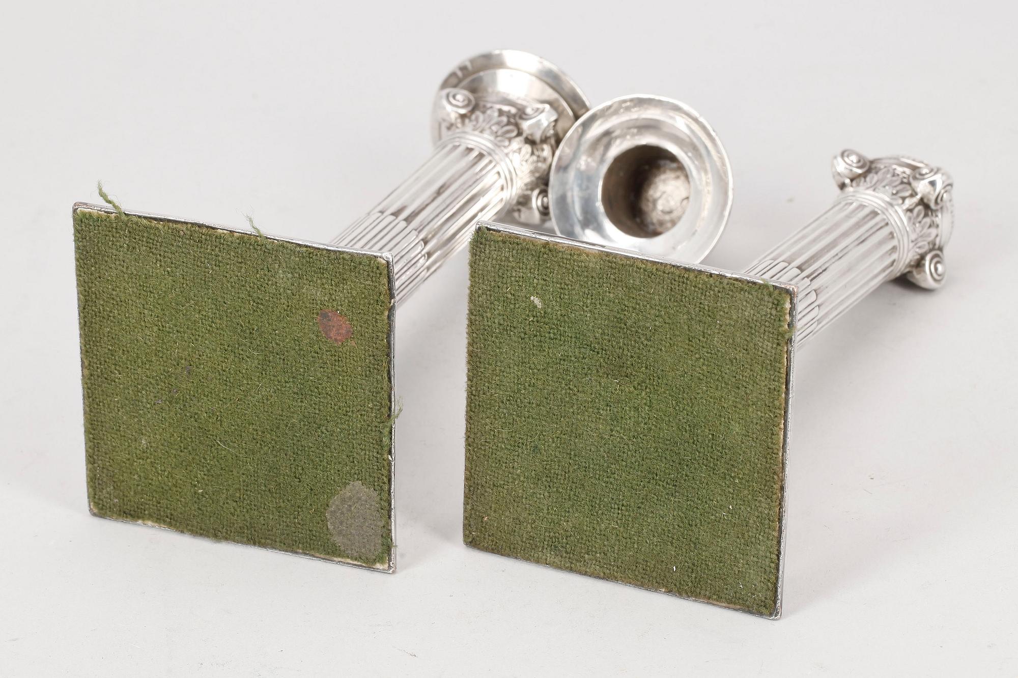 LJUSSTAKAR, ett par, nysilver, 1800-tal.