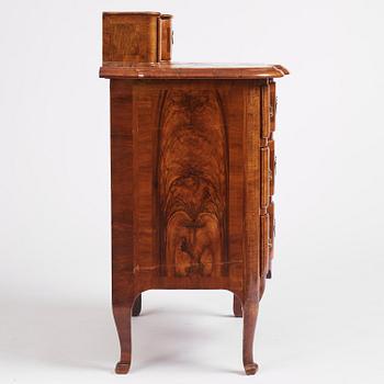 A late Baroque walnut commode by J. H. Fürloh (master in Stockholm 1724-45).