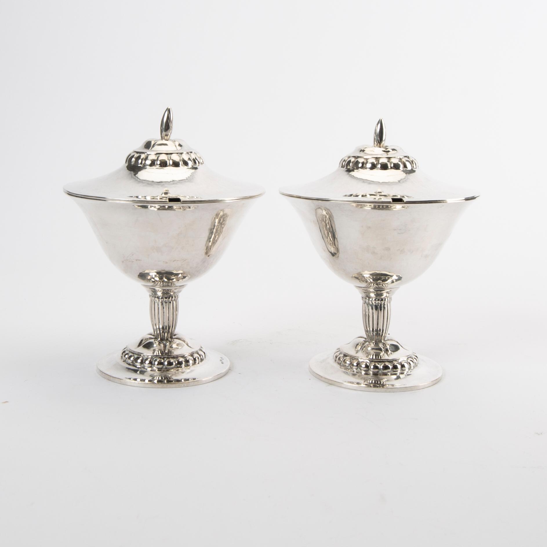 A 20th century pair of sivler suger bowls mark of CF Carlman Stockholm 1917 total weight 570 grams.