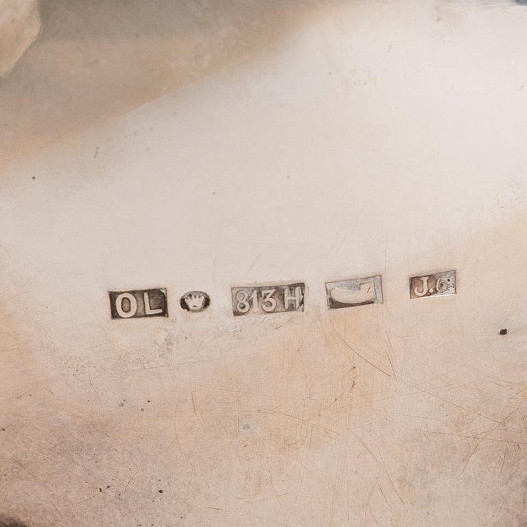 A silver sugar tong and a 3-piece silver coffee set, mark of Juho H. Pekuri, Oulu 1931 and Finnish import marks 1938.