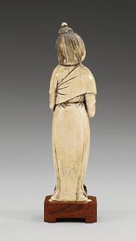 A Tang style ivory figure of a court lady, presumably late Ming dynasty (1368-1644).