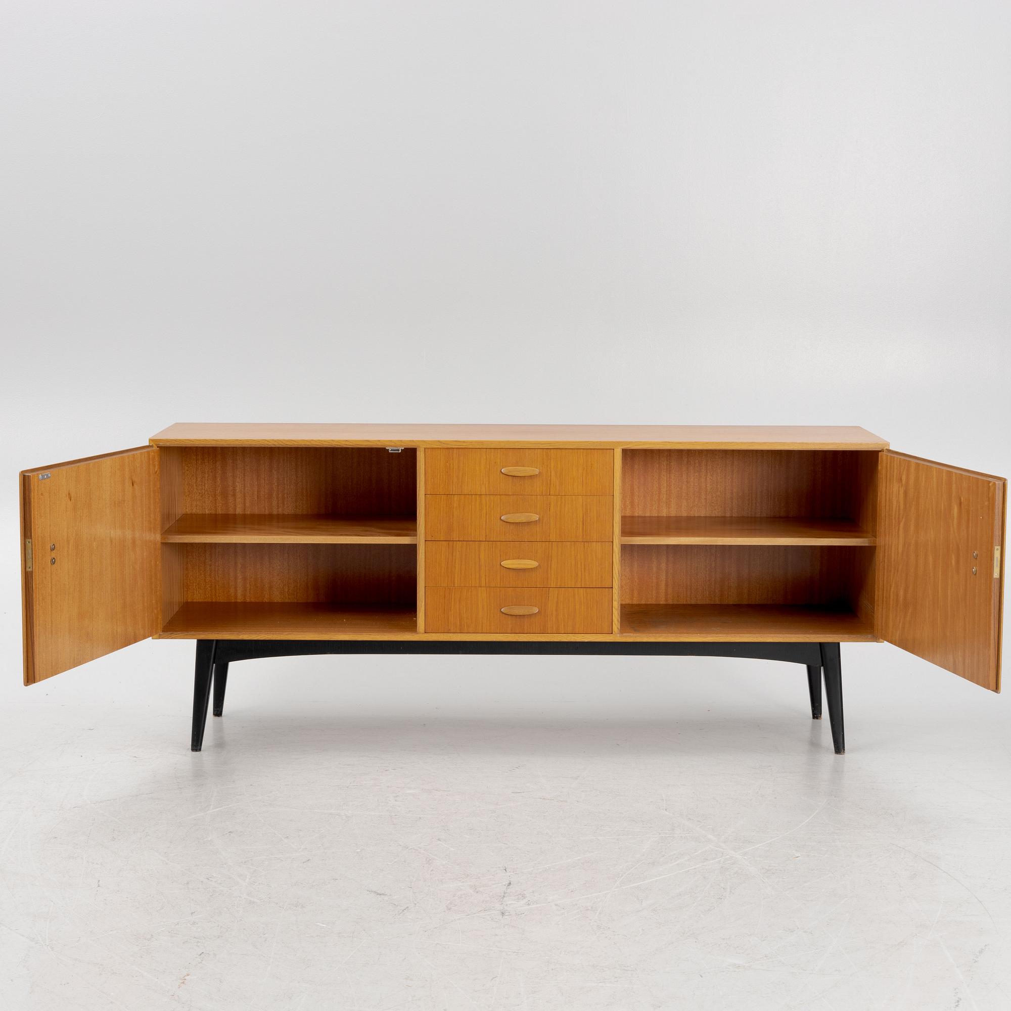 A Mid-20th Century Teak Sideboard.