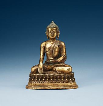 A seated bronze Akshobhya Buddha, late Qing dynasty.