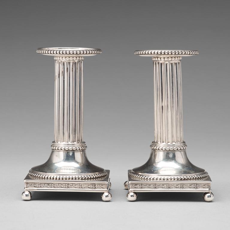 A pair of Swedish 18th century silver candlesticks, mark of Johan Ekholm, Stockholm 1799.