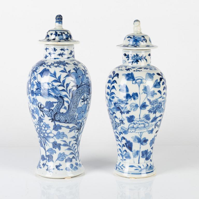 Two Chinese blue and white vases with covers, late Qing dynasty.