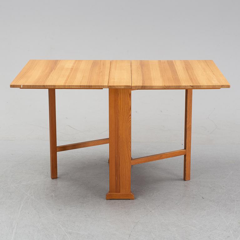 A Carl Malmsten pine percussion table "the armourer" (Vapensmeden).