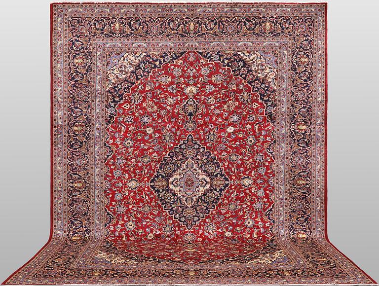 A Keshan carpet, 390 x 297 cm.