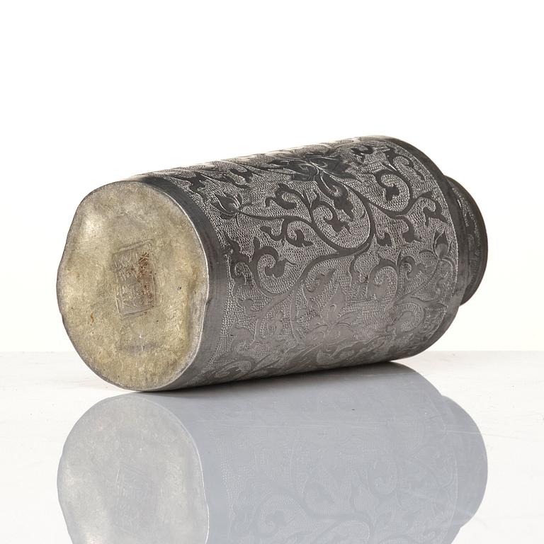 A Chinese lacquer box with a set of five pewter tea caddies, Qing dynasty, 18/19th Century.