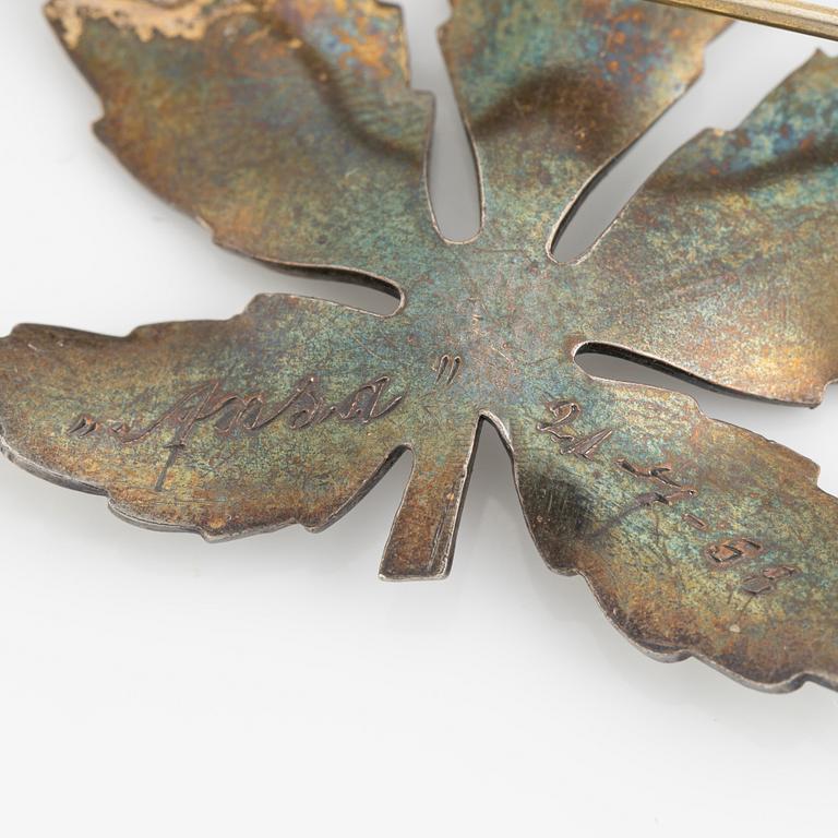 Two silver and enamel brooches, one by David Andersen, Norway.