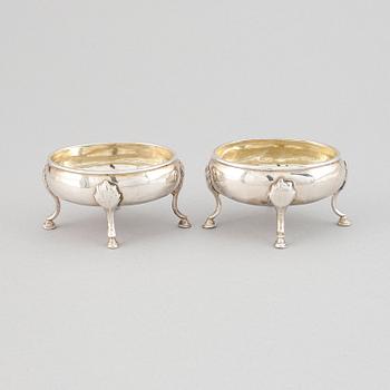 A pair of silver saltcellars, London, England.