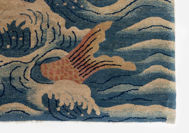 An antique Baotou rug, northern China, late Qing dynasty, circa 1900. c. 178x90 cm.