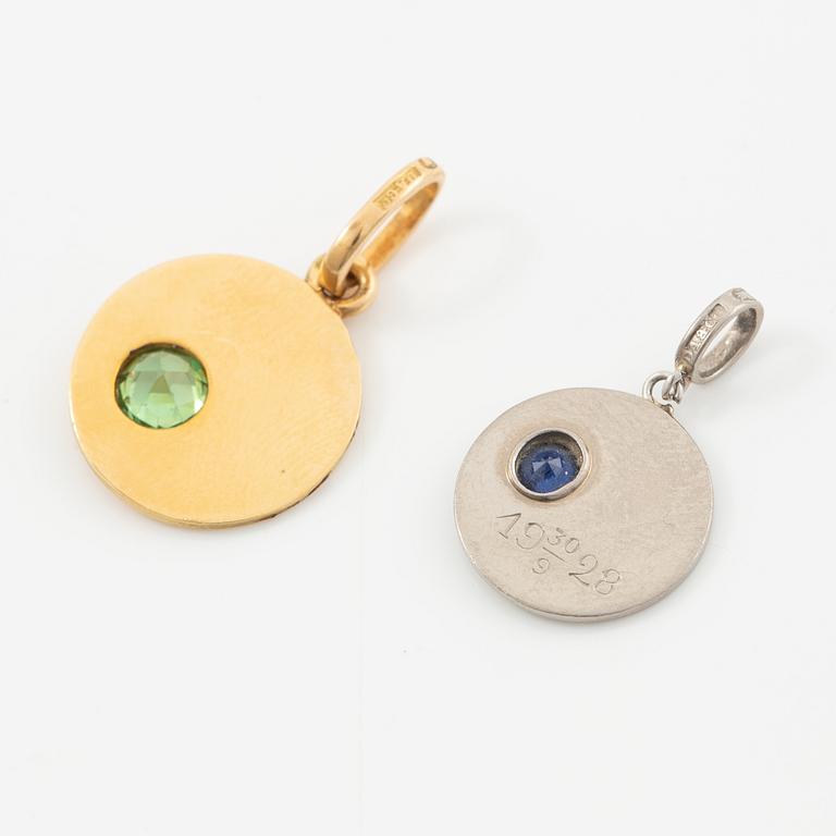Two pendants in 18K gold and white gold.