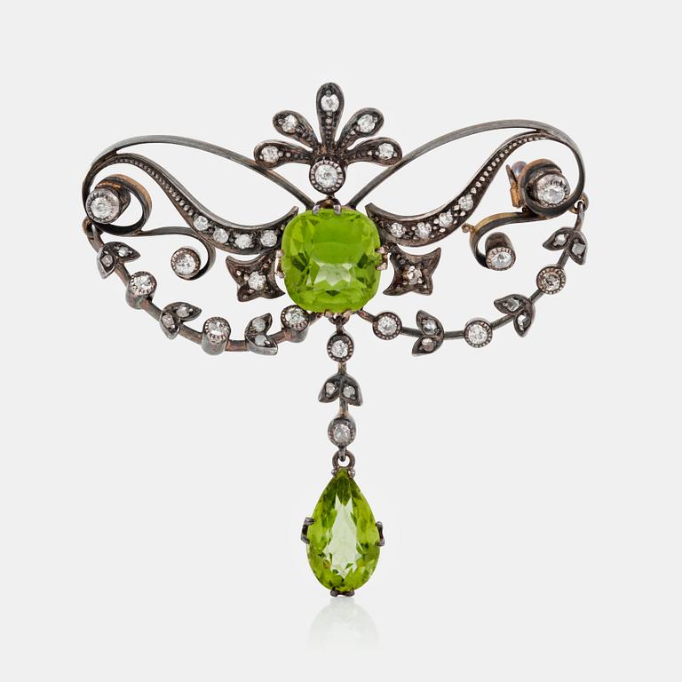 A late Victorian peridot and old- and rose-cut diamond brooch.