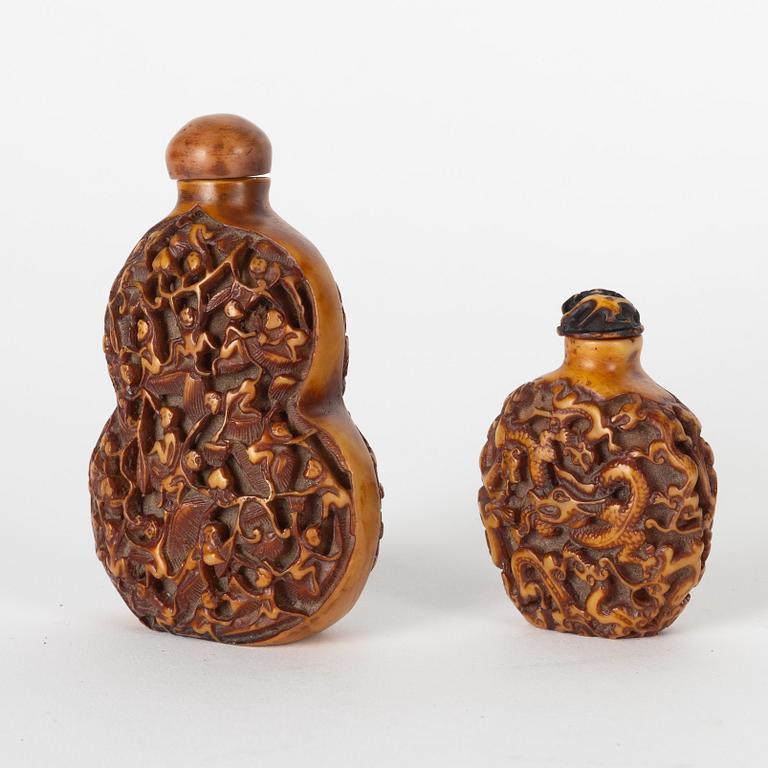 Two carved snuff bottles, China, 20th century.