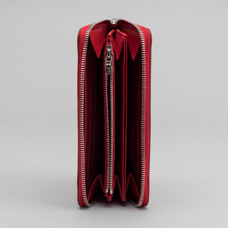 A Louis Vuitton zippy wallet.