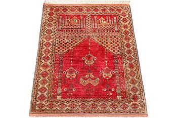 A silk Beluch rug, c. 124 x 81 cm.