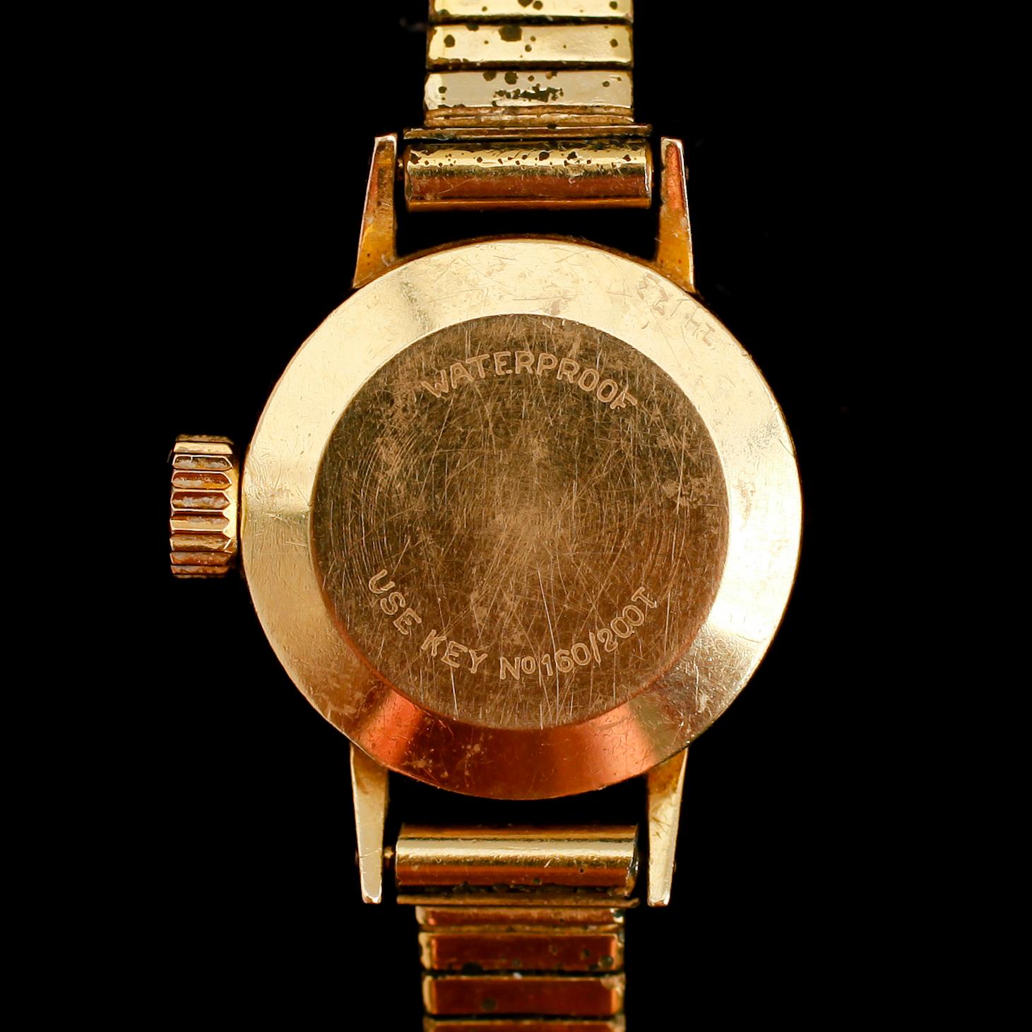 DAMARMBANDSUR, 18 k guld, Tissot Seastar Seven, 1900-talets mitt.