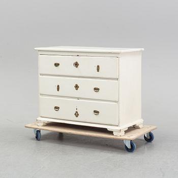 A painted chest of drawers, mid 18th Century.