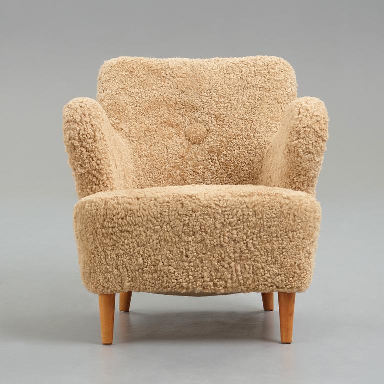 Gustav Axel Berg, a Swedish Modern easy chair for AB G.A. Bergs, 1940's.