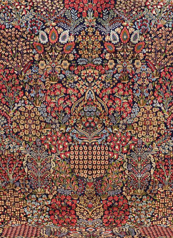 A carpet, Kerman, around  408 x 300 cm.