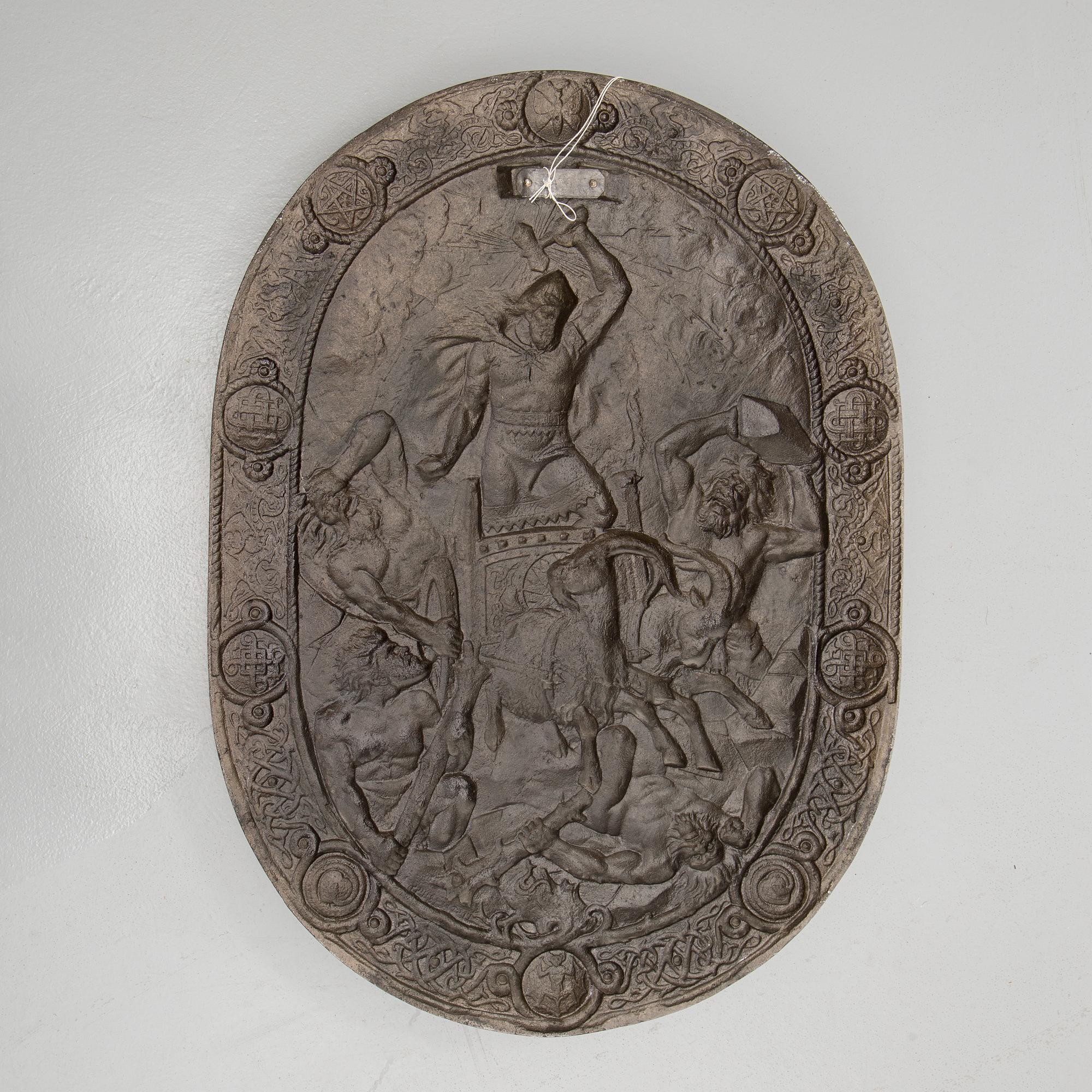 An iron shield by Brevens Bruk, 20th century.