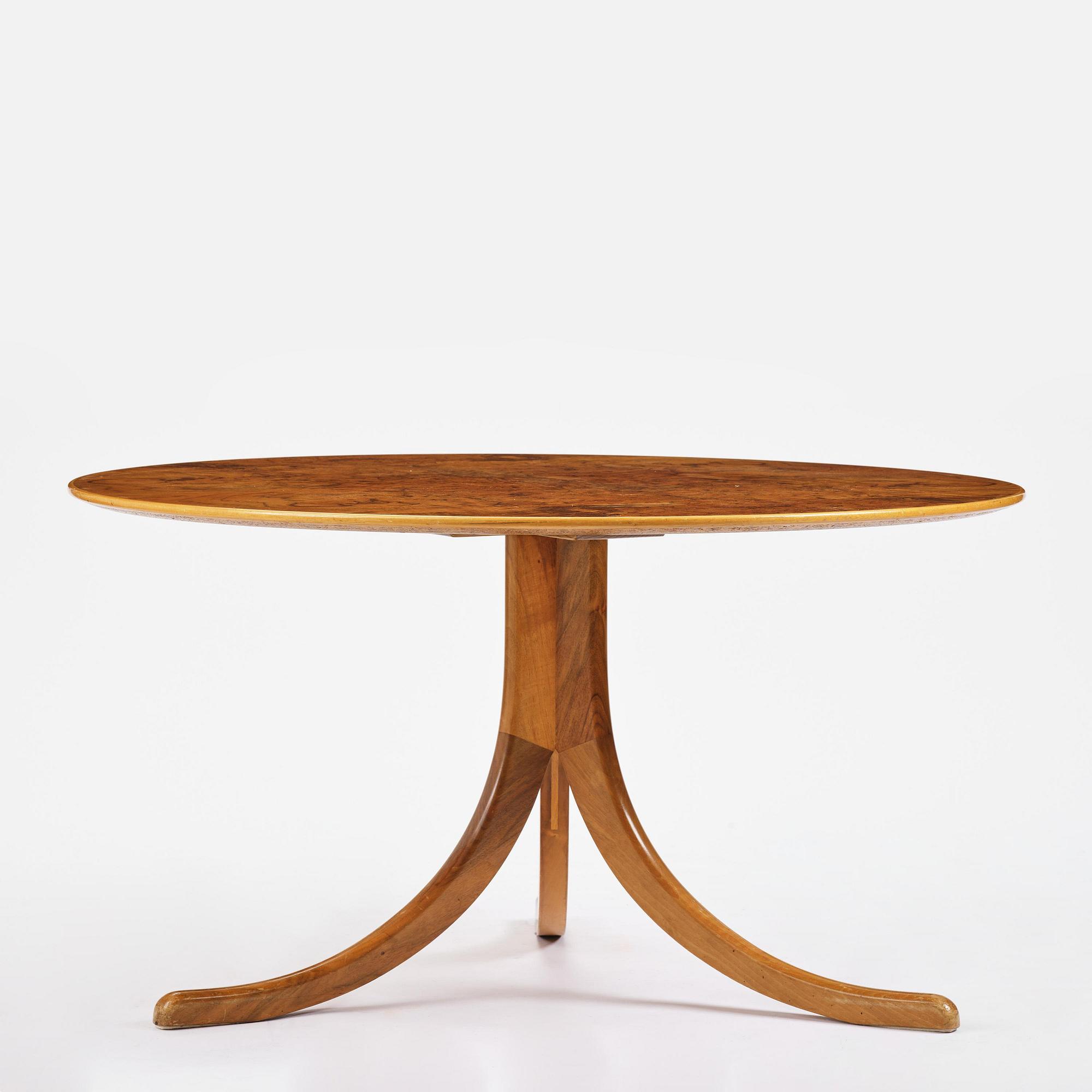 Josef Frank, a walnut veneered table model 1028, Firma Svenskt Tenn, pre 1985.
