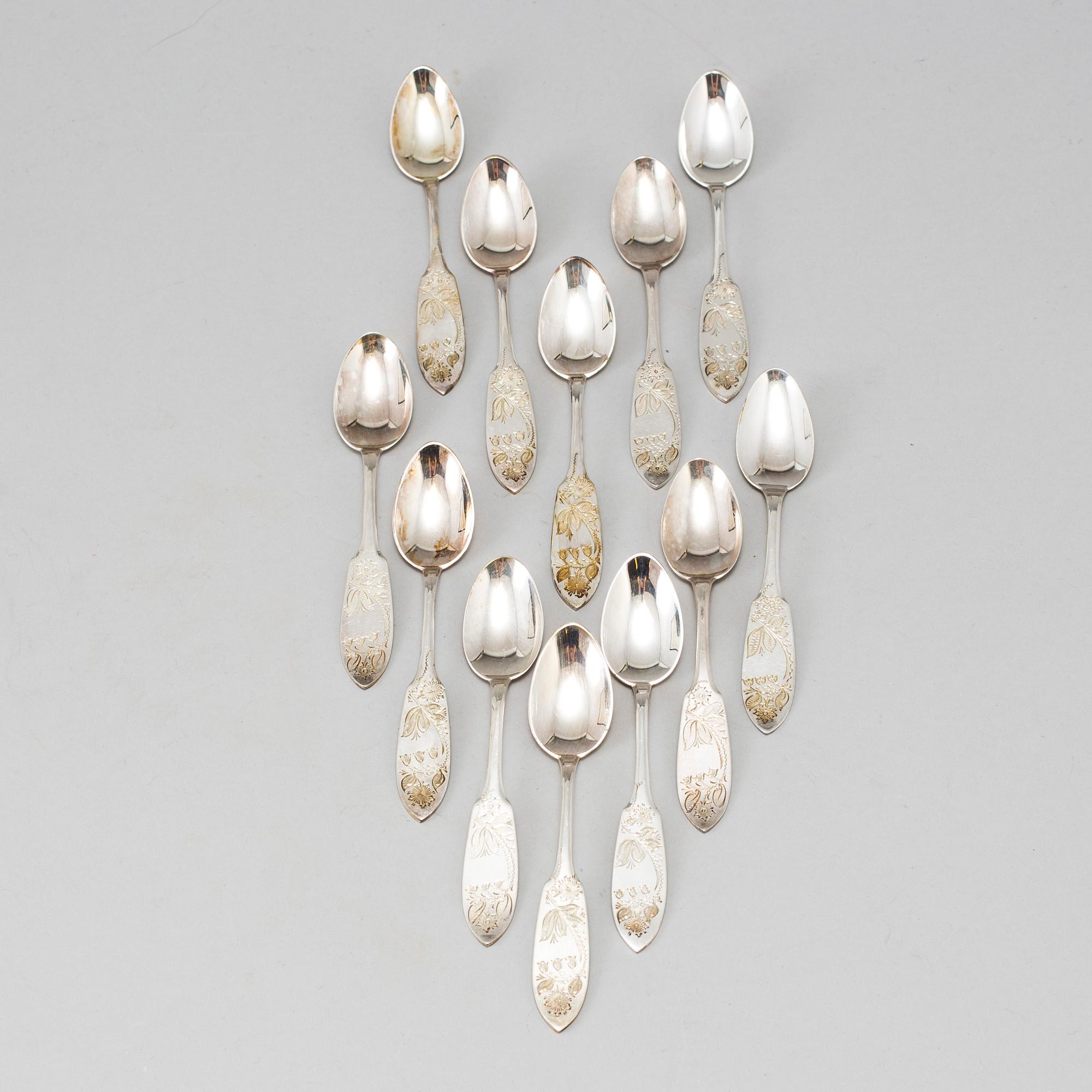 a lot of 24 silver spoons by C O Persson AB in Haparanda, Sweden. Weight ca 522 grams.