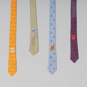 A set of four silk ties by Hermès.