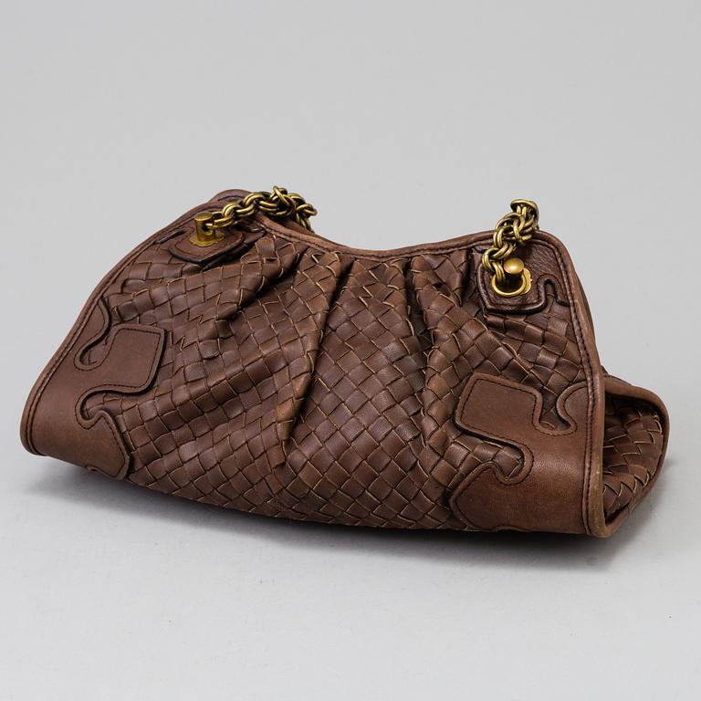 A Bottega Veneta handbag.