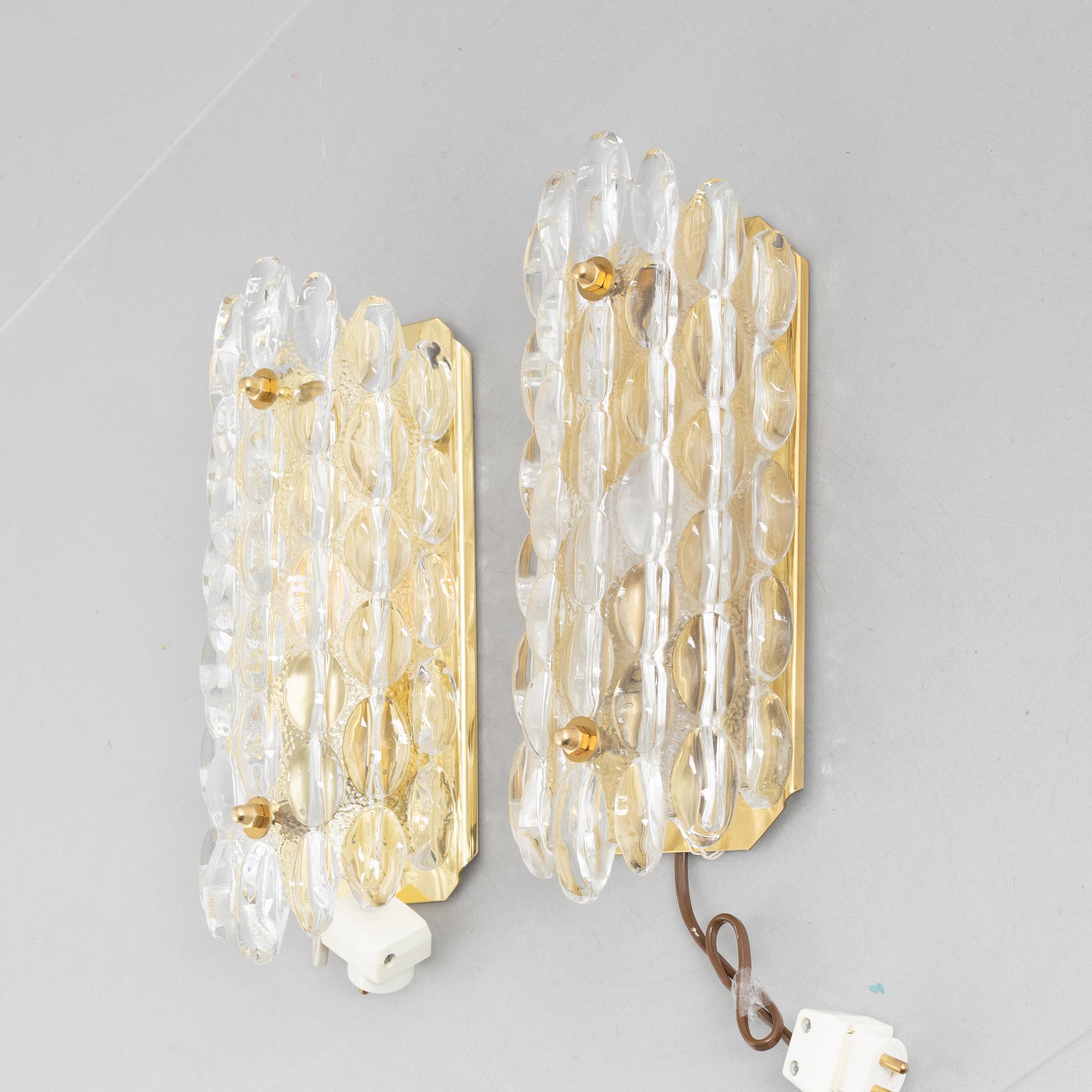 Carl Fagerlund, a pair of wall lamps, model 2355/111, Orrefors.