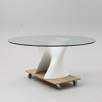 Xavier Lust, a glass top 'S Table' dining table, MDF Italia.