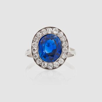 1252. An untreated sapphire, 4.48 cts and brilliant-cut diamonds, circa 0.75 ct in total, ring.