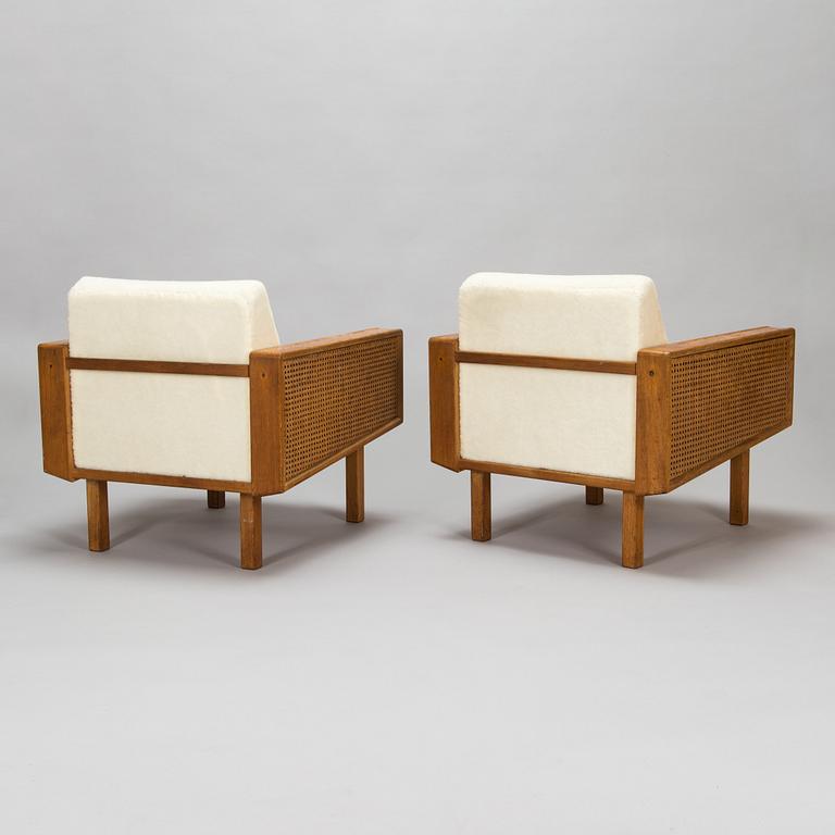 A pair of 1960's armchairs.