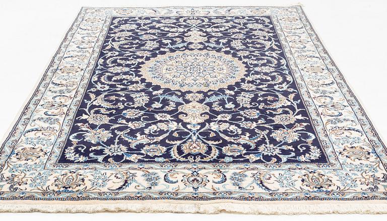 A Otiental carpet, c. 302 x 194 cm.