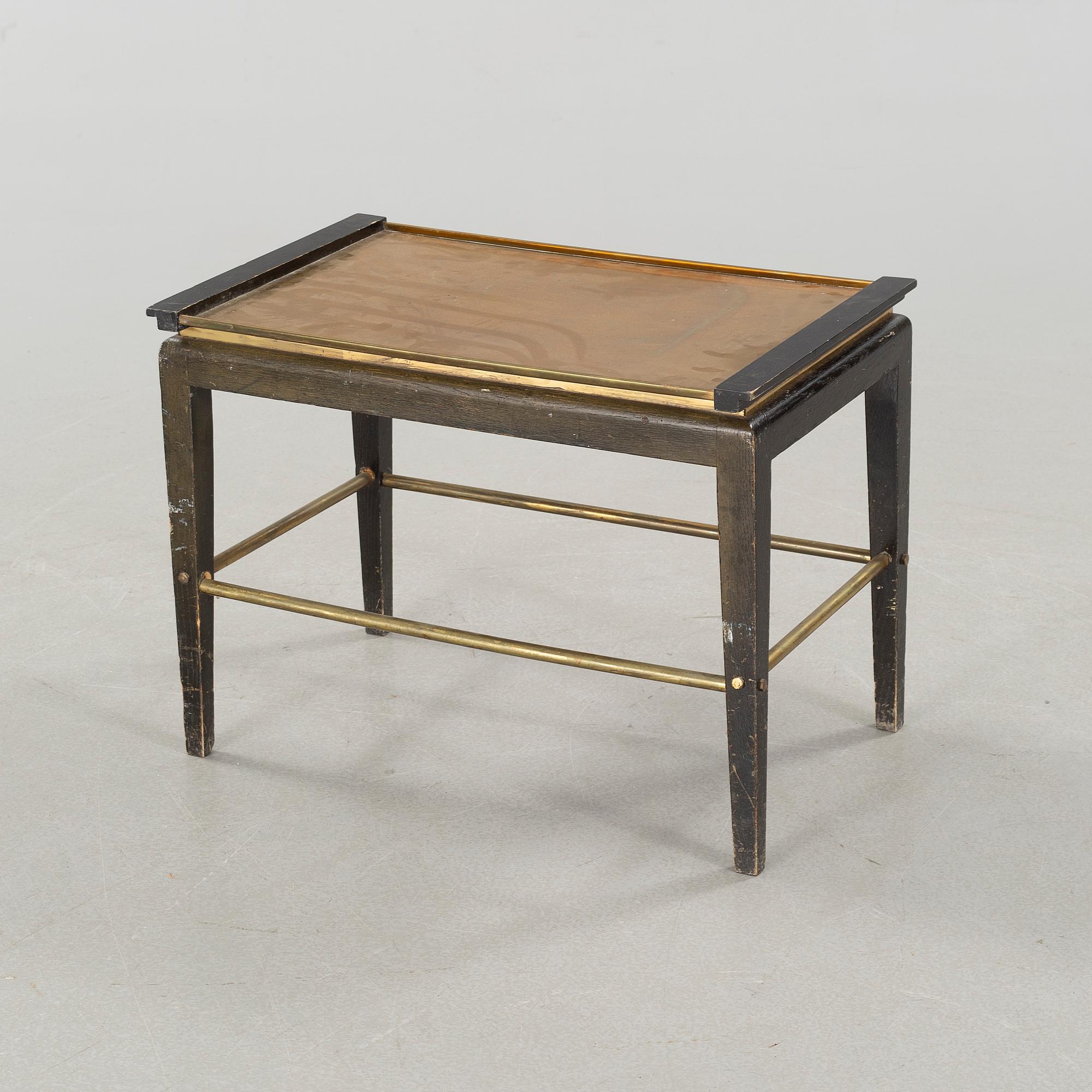 A tray table from the first half of the 20th century by Ystad Brons.