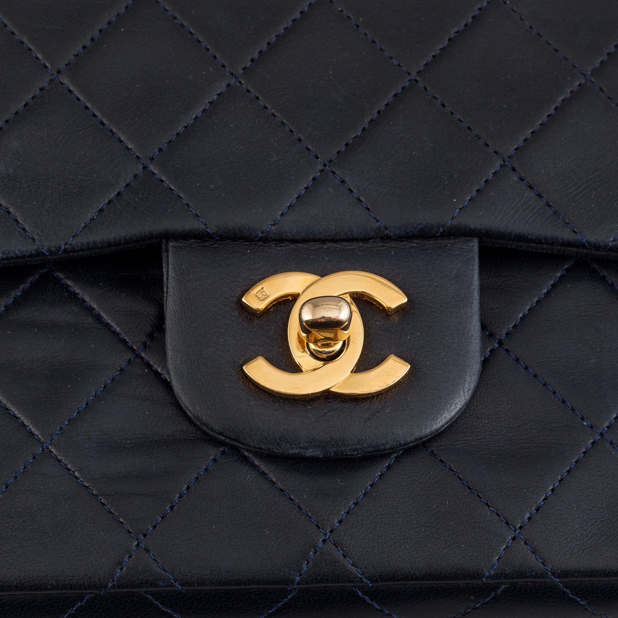 Chanel, a navy leather 'Double Flap Bag', 1989-91.