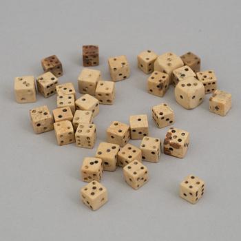 A COLLECTION OF 34 BONE MINIATURE DICE, 19th century.