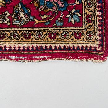 A Keshan silk rug, ca 198x129 cm.