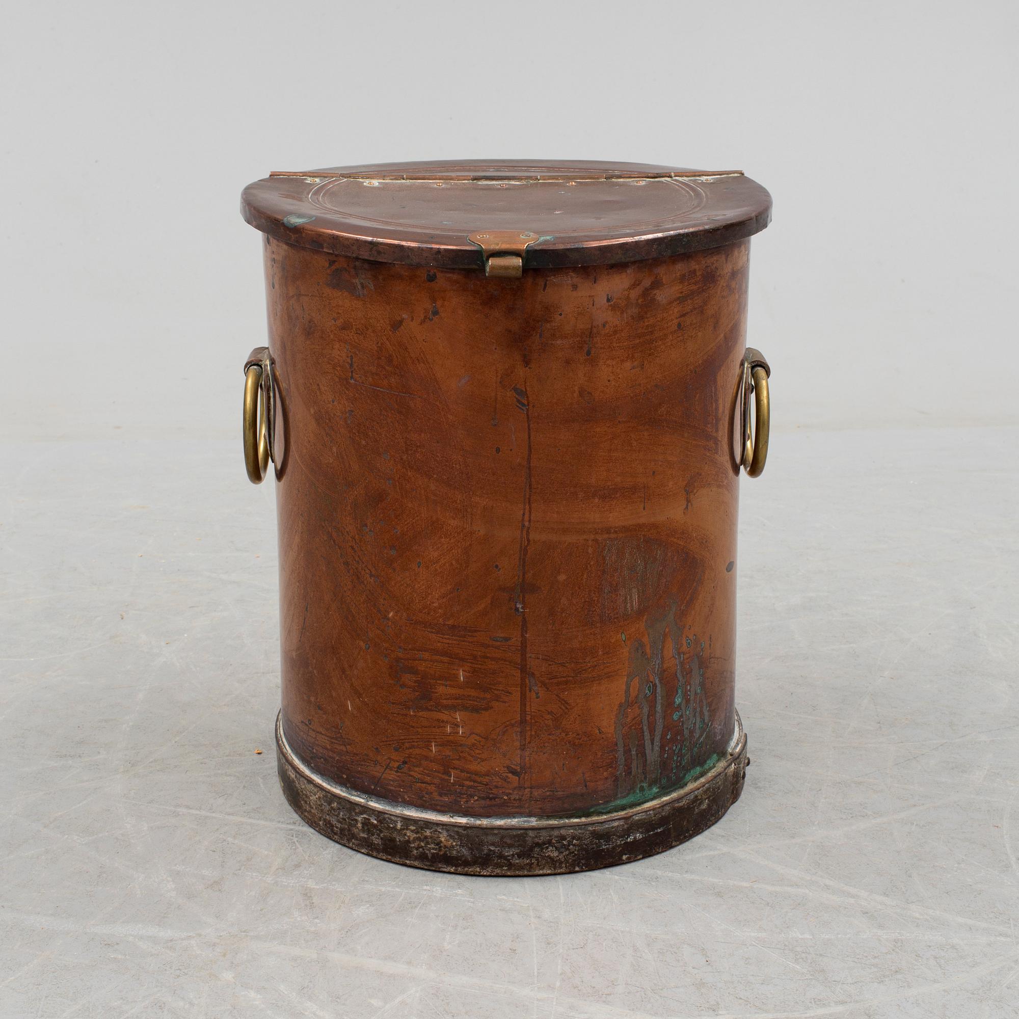 A copper water container, around the year 1900.