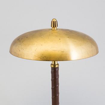 A Einar Bäckström brass table light from Malmö, 1940s.