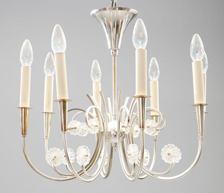 TAKKRONA, nysilver, 1900-tal, h ca 46.