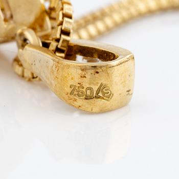 Pendant with chain, 18K gold set with a pink and red toned drop-shaped tourmaline and brilliant-cut diamonds.