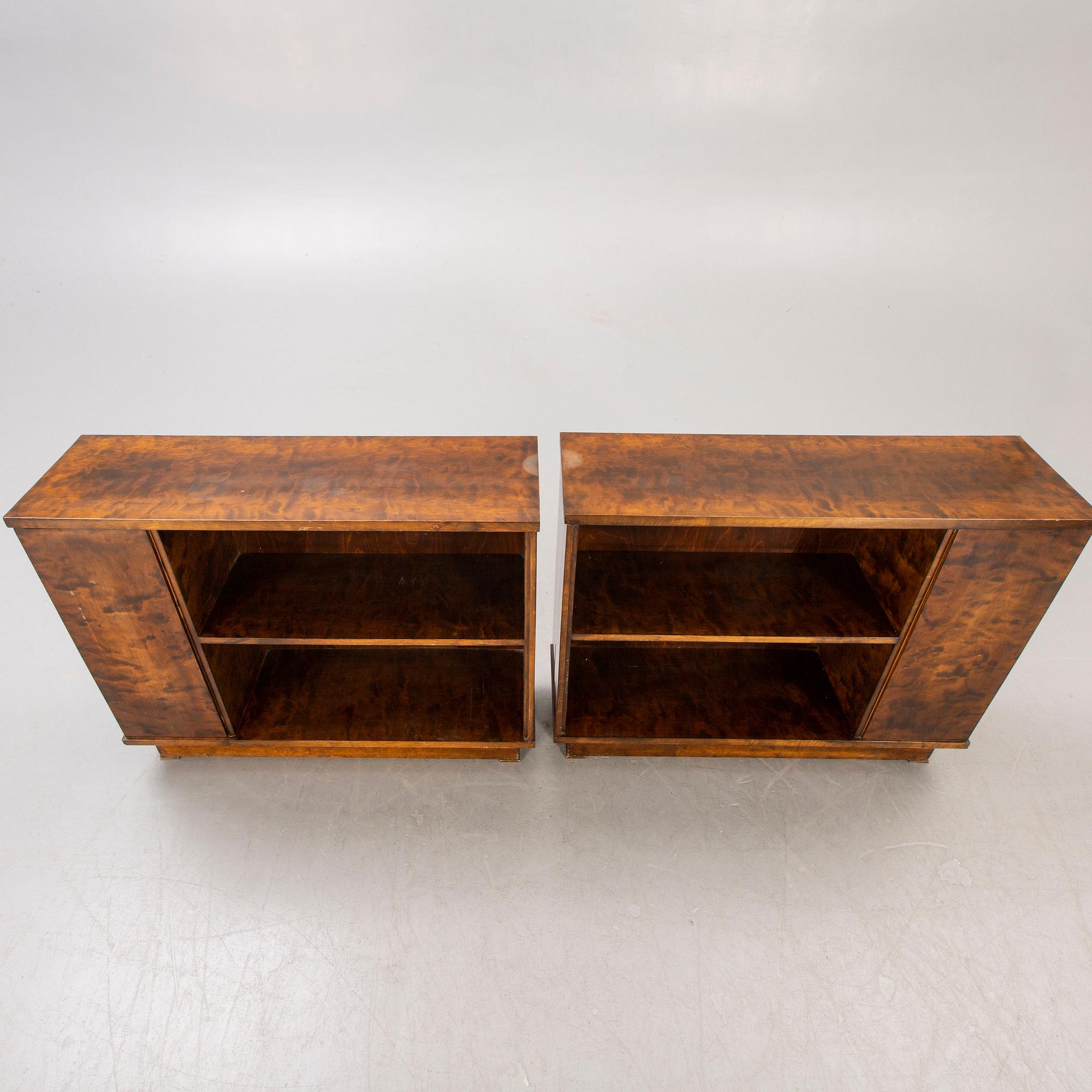 A pair of 1930s birch bookshelves.