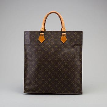 A Louis Vuitton "Sac Plât" bag.