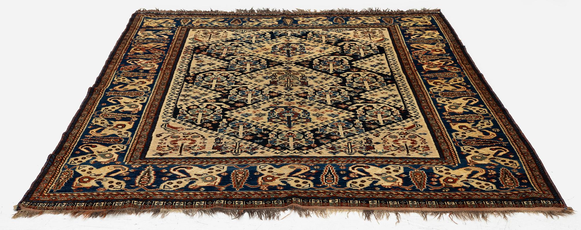 An antique Qashqai rug, South Persia, c. 189 x 142 cm.